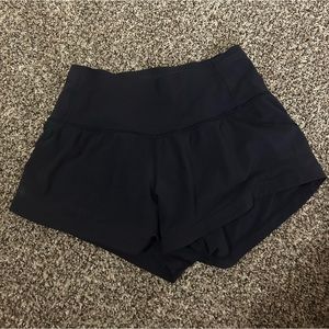 Navy Lululemon high wasted shorts.